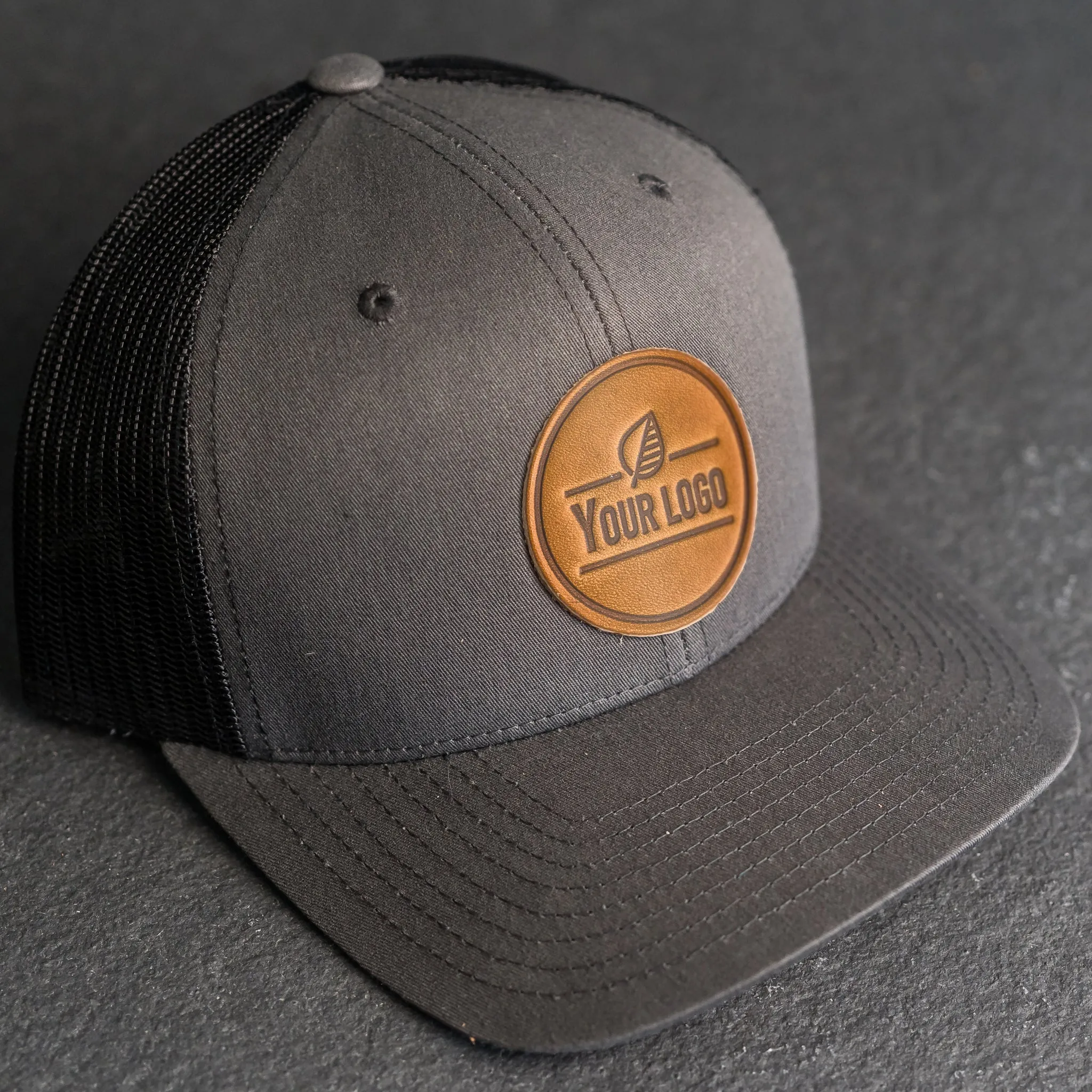 Your Logo on a Leather Patch Trucker Style Hat - Circle Patch