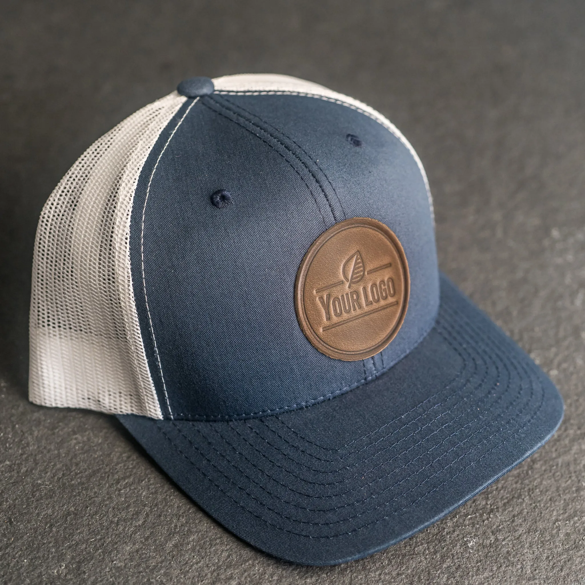Your Logo on a Leather Patch Trucker Style Hat - Circle Patch