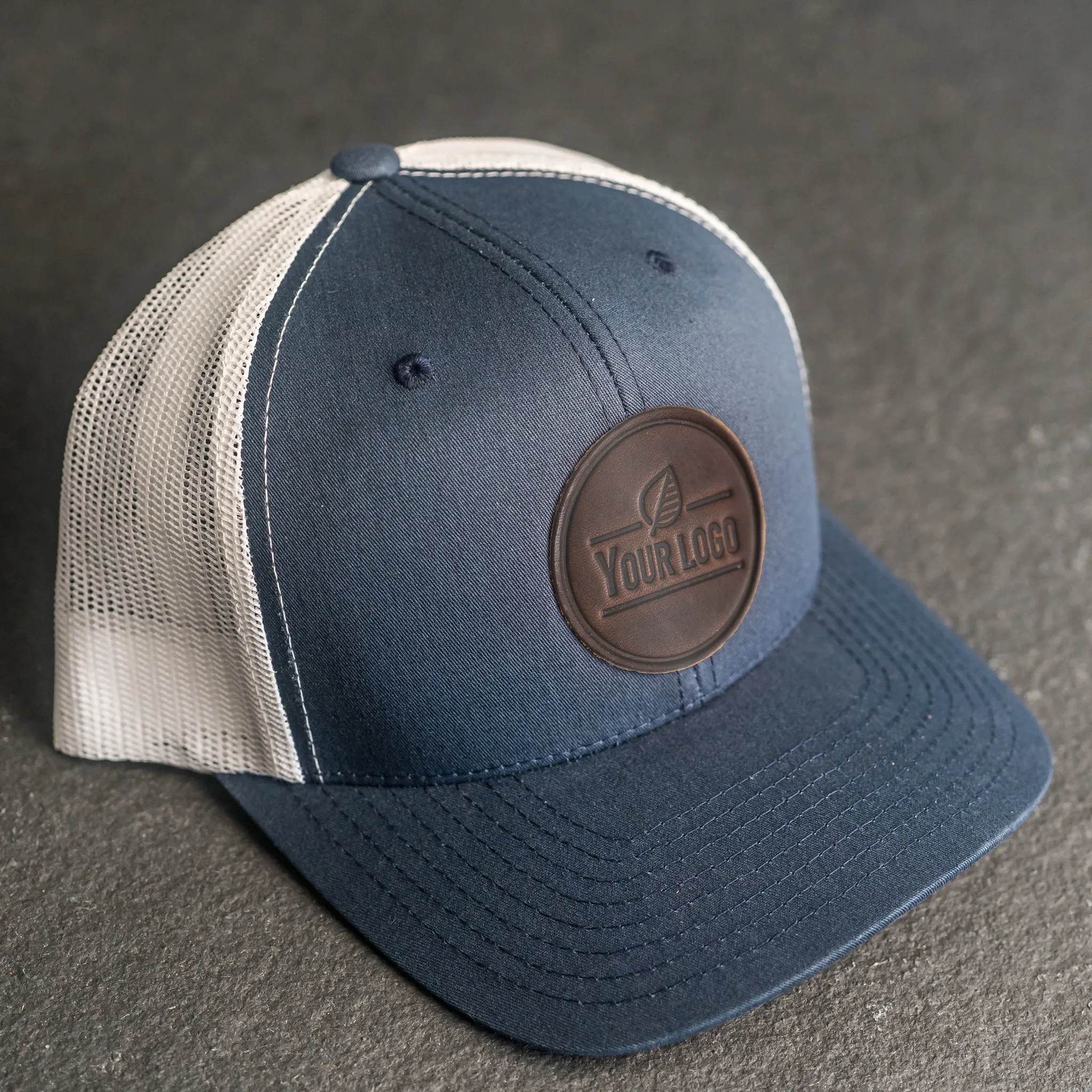 Your Logo on a Leather Patch Trucker Style Hat - Circle Patch