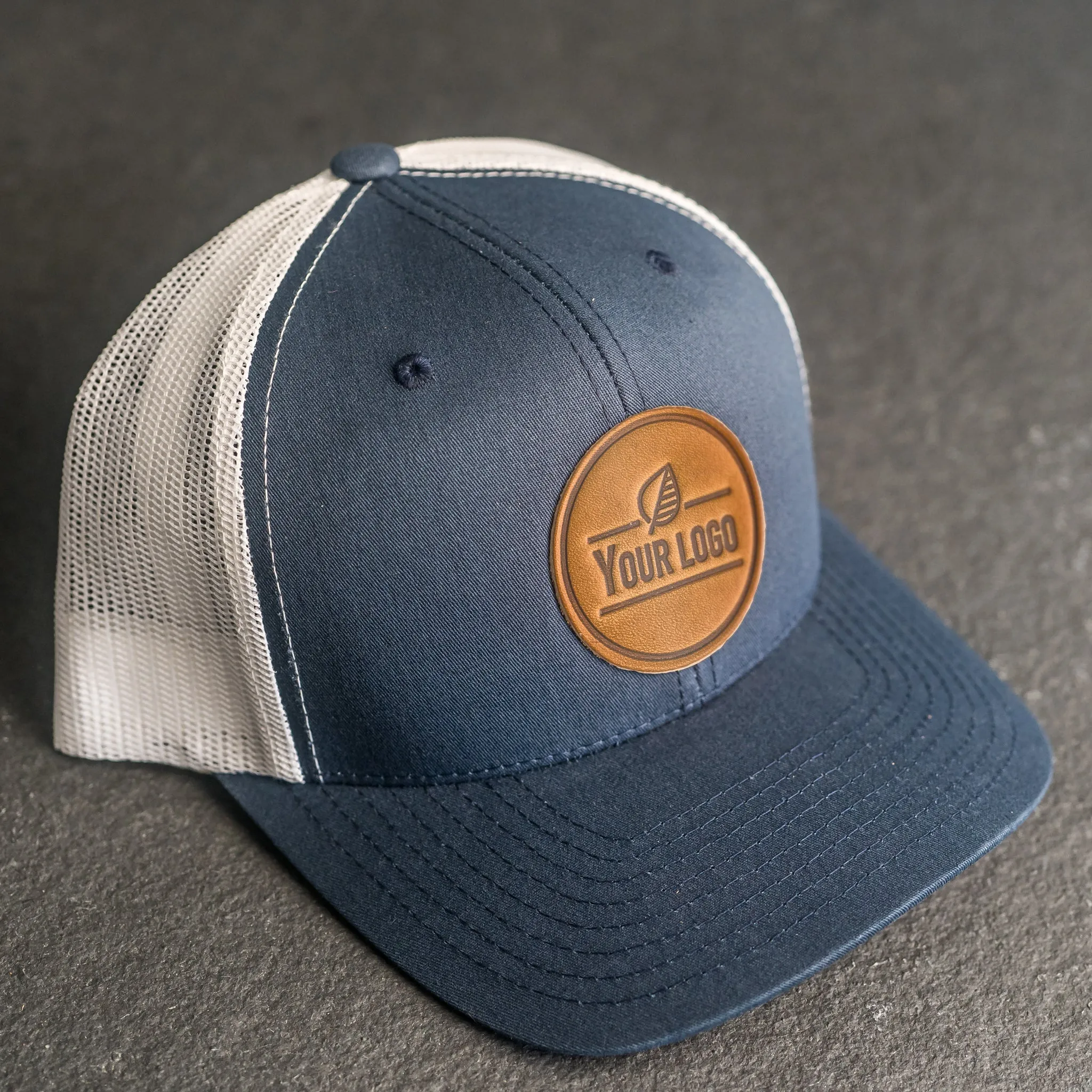 Your Logo on a Leather Patch Trucker Style Hat - Circle Patch